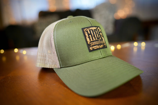 "Hide Camo Logo" Design Trucker Hat (Khaki Mesh/ Moss Green Fabric)