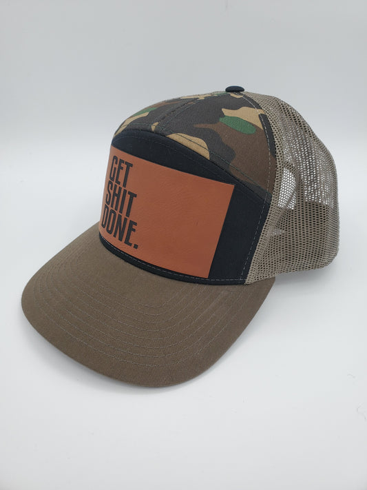 "GET SHIT DONE" 7 Panel Trucker Hat (Black/ Green Camo/ Loden)