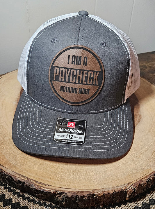 "I Am A Paycheck, Nothing More" trucker cap (charcoal front/white mesh)
