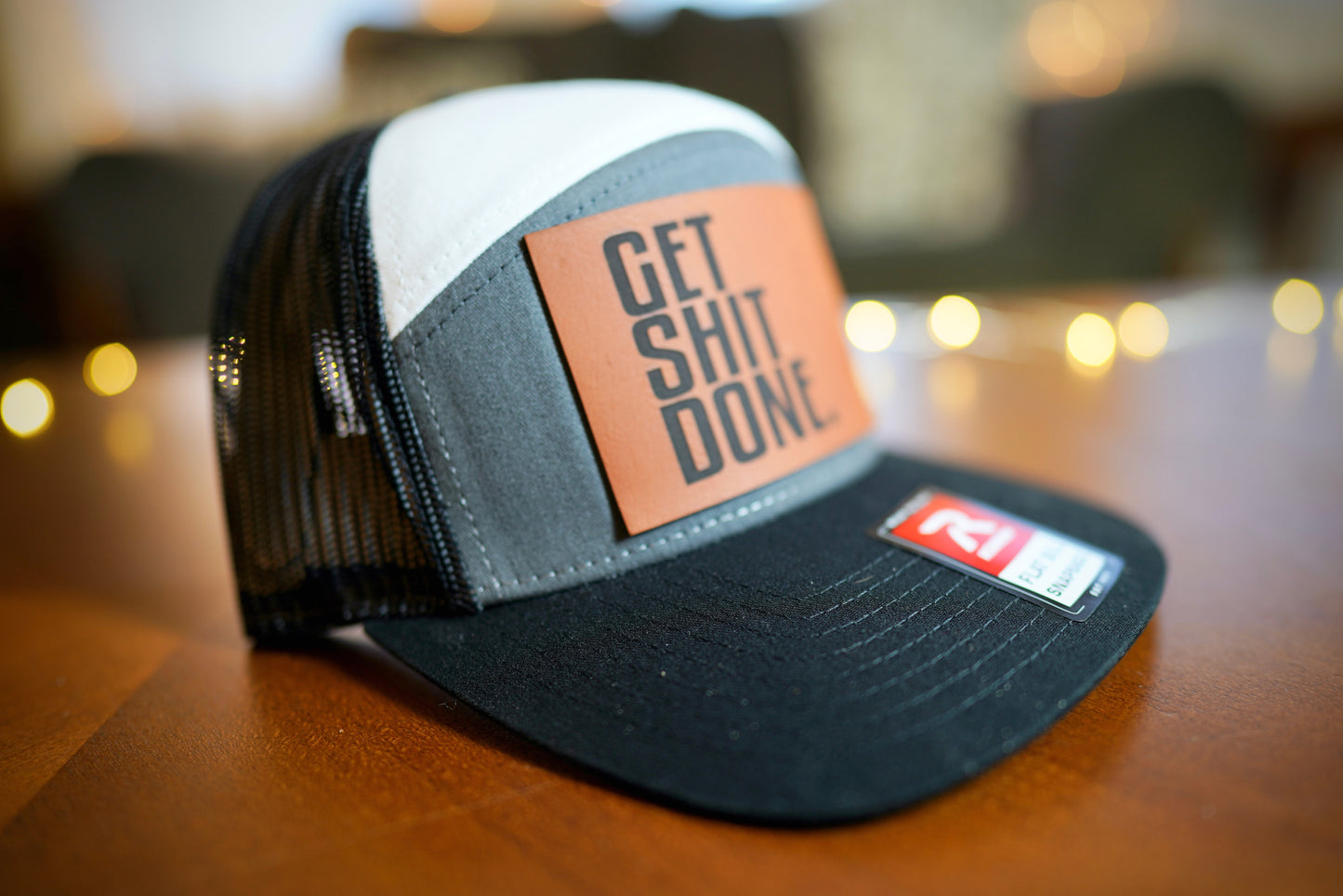 "GET SHIT DONE" 7 Panel Trucker Hat (Charcoal/ White/ Black)