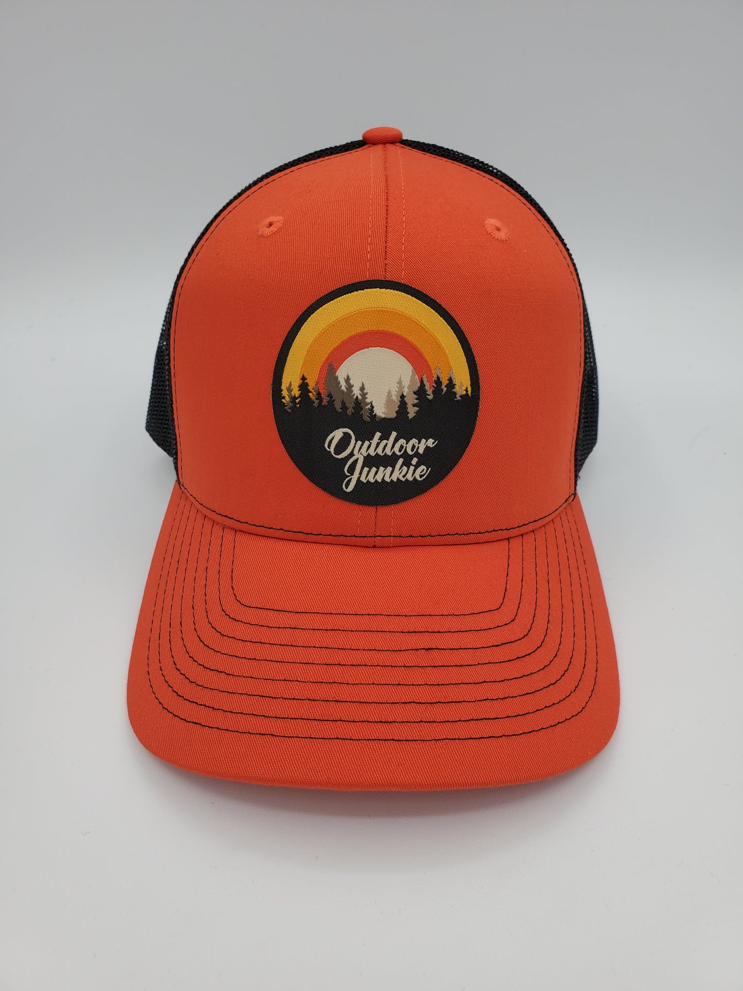 "Outdoor Junkie" Design Trucker Hat (Black Mesh/ Orange Fabric)