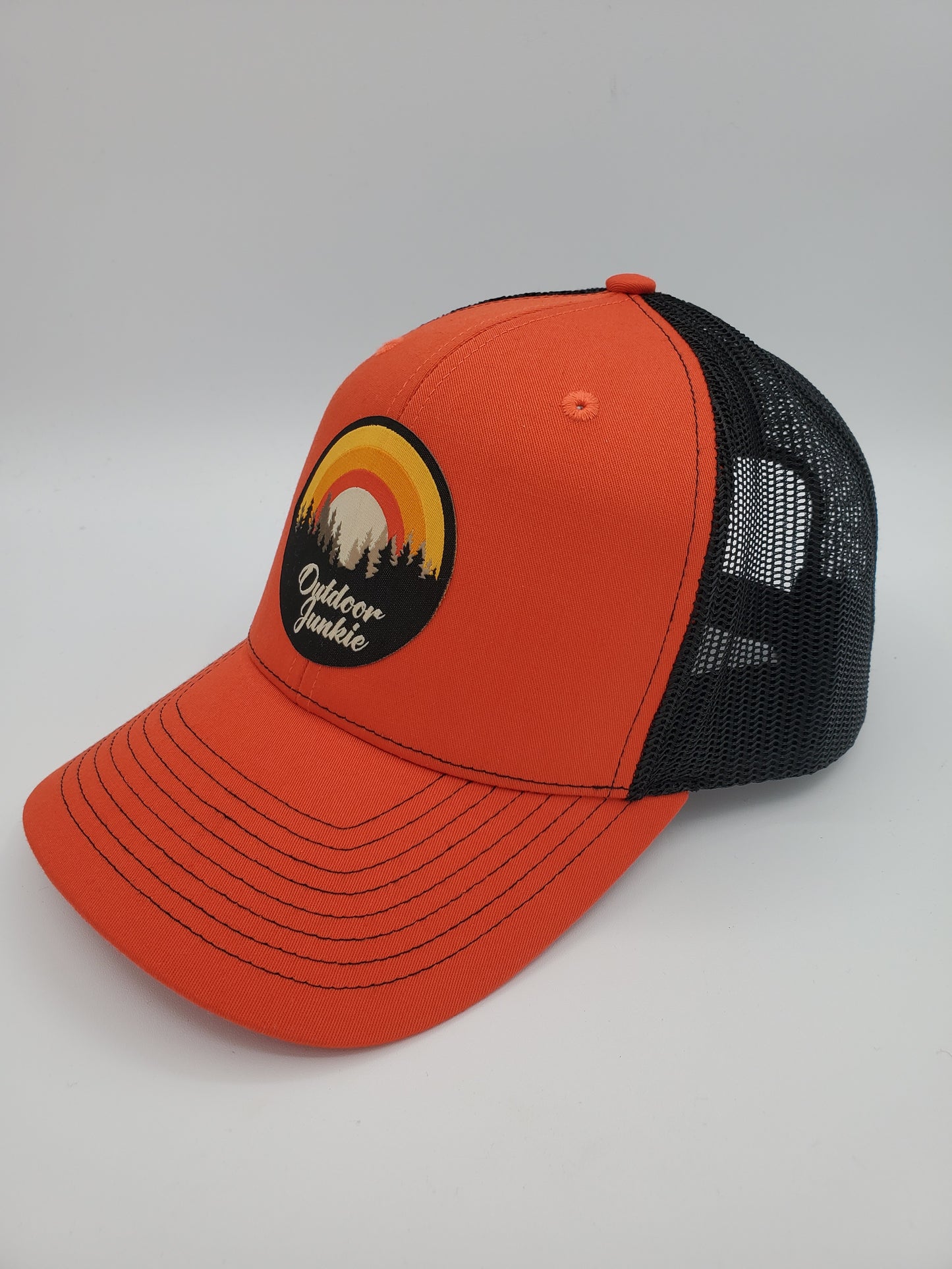 "Outdoor Junkie" Design Trucker Hat (Black Mesh/ Orange Fabric)